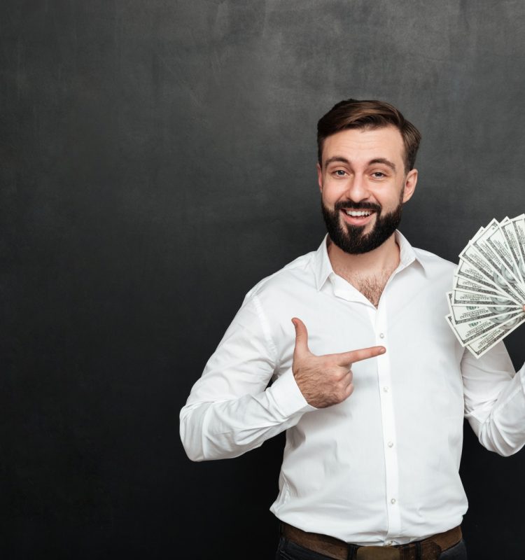 portrait-adult-man-white-shirt-posing-camera-with-fan-100-dollar-bills-hand-being-rich-happy-dark-gray_171337-588